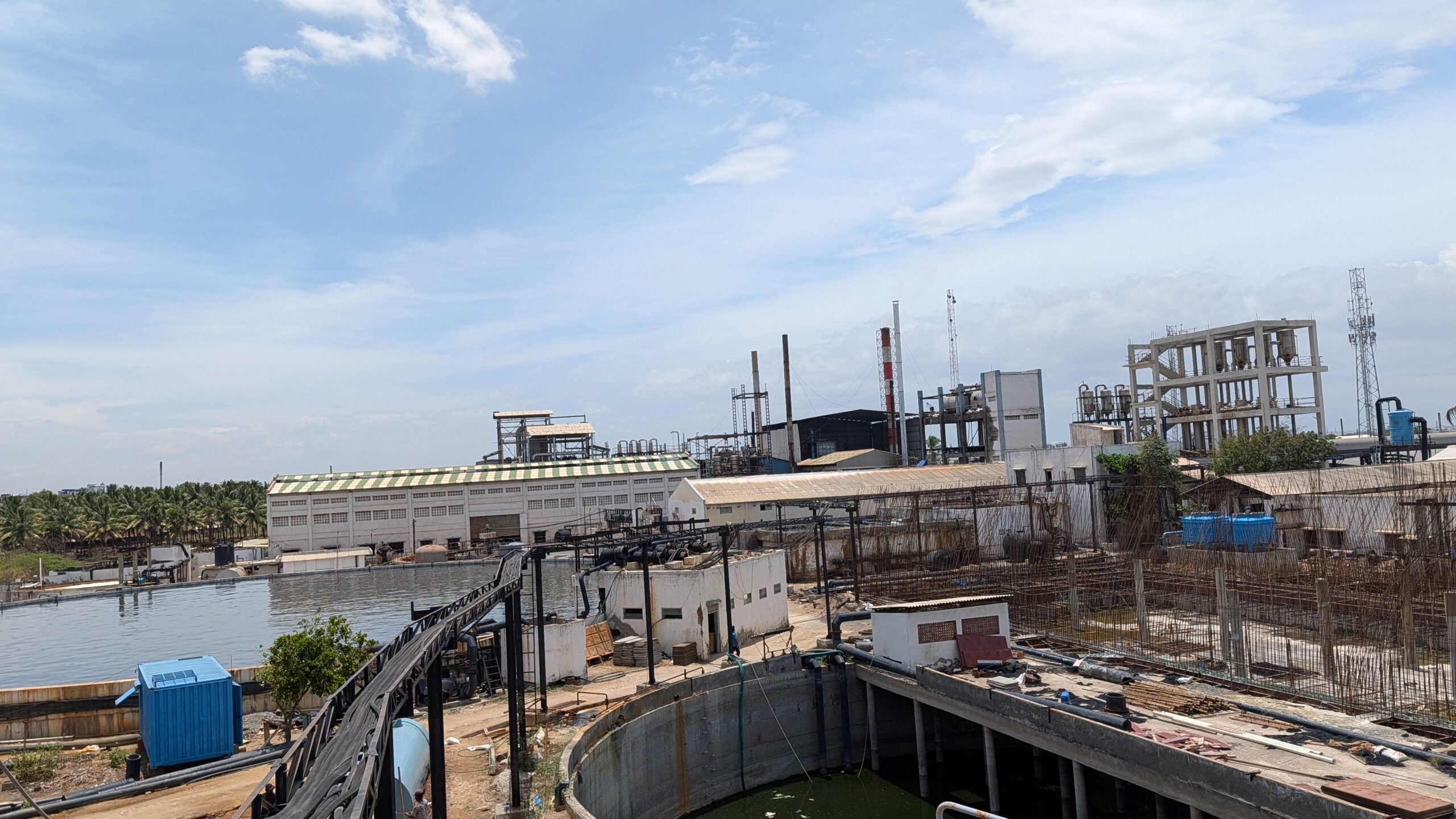 Processing and effluent-treatment infrastructure at a Tiruppur textile unit, with expansion works underway.